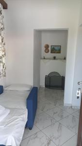 Postel nebo postele na pokoji v ubytování Villa Karapataki