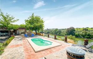 The swimming pool at or close to Stunning Home In Villafranca De Cordoba