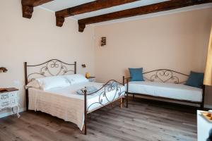 Postel nebo postele na pokoji v ubytování Villa Guajira