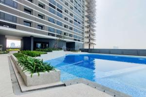 Πισίνα στο ή κοντά στο Good and Homey Studio at Collins Boulevard Apartment By Travelio
