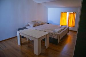 Postel nebo postele na pokoji v ubytování Alpin Guest House