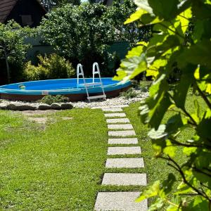 Bazén v ubytovaní Private Voyage - Pool Grill Patio alebo v jeho blízkosti