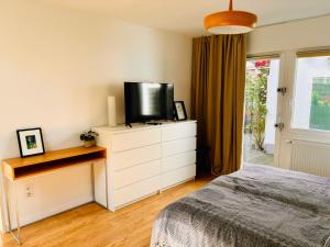 Postel nebo postele na pokoji v ubytování Gemütliches Design Apartment im Norden von Bremen