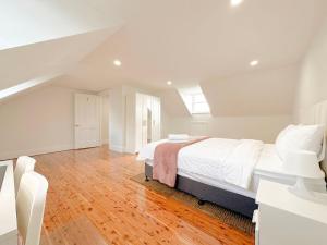 Voodi või voodid majutusasutuse Millers Point Waterview toas