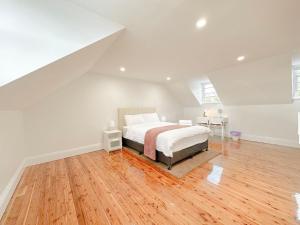 Voodi või voodid majutusasutuse Millers Point Waterview toas