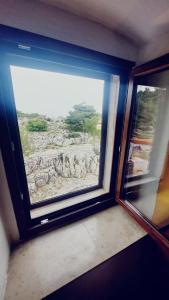 Fotografie z fotogalerie ubytování Apartmani Milenko Lubenice v destinaci Lubenice