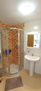a bathroom with a shower and a sink at EnBURELA Confort y Relax in Burela de Cabo