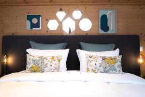 Chalet 4 Saisons客房内的一张或多张床位