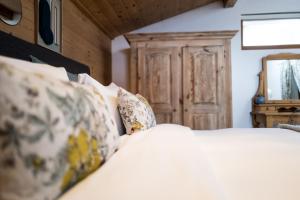 Chalet 4 Saisons客房内的一张或多张床位