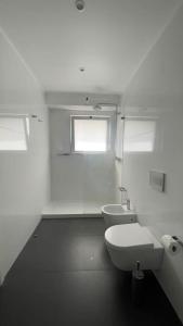 Et badeværelse på Casa do Mar North + 12 billeder