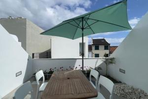 En balkon eller terrasse på Casa do Mar North