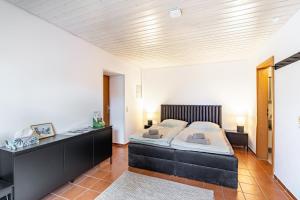 Postel nebo postele na pokoji v ubytování Ersfeld - Bad Teinach Appartment