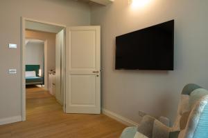 TV in/ali zabaviščno središče v nastanitvi Suite Greve in Chianti