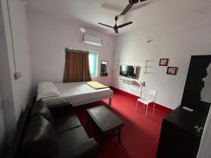 Raj Andar Guest House客房内的一张或多张床位