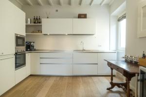 Kuhinja oz. manjša kuhinja v nastanitvi Suite Greve in Chianti