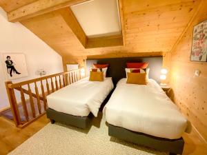 Chalet 4 Saisons客房内的一张或多张床位