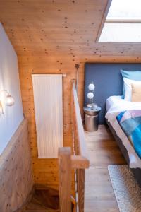 Chalet 4 Saisons客房内的一张或多张床位