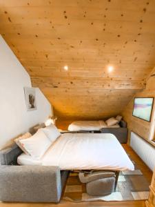 Chalet 4 Saisons客房内的一张或多张床位