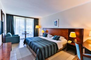Postel nebo postele na pokoji v ubytování Hotel Princess