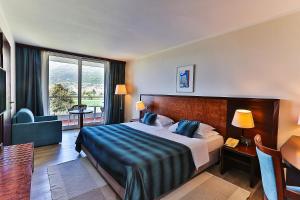 Postel nebo postele na pokoji v ubytování Hotel Princess