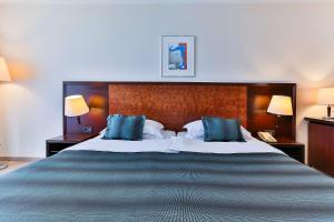 Postel nebo postele na pokoji v ubytování Hotel Princess