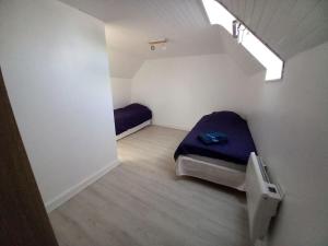 Postel nebo postele na pokoji v ubytování Gîte entre Mer et Abers