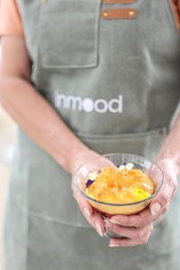 a person holding a bowl of food in their hands at Inmood Aucanada 4 Sup in Port d'Alcudia