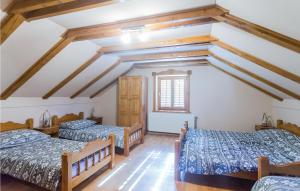 Ein Bett oder Betten in einem Zimmer der Unterkunft 3 Bedroom Gorgeous Home In Cacinci