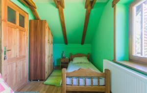 Ein Bett oder Betten in einem Zimmer der Unterkunft 3 Bedroom Gorgeous Home In Cacinci