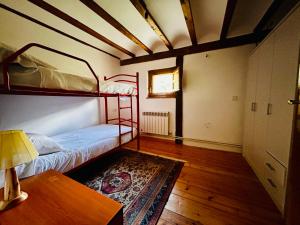 Postel nebo postele na pokoji v ubytování Albergue Rural de Yanguas