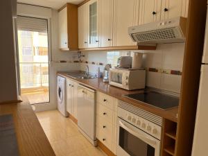 Η κουζίνα ή μικρή κουζίνα στο Vista Marina Apartment La Manga