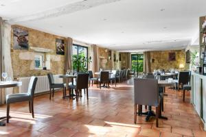 Restaurace v ubytování Logis Hôtel La Ferme de Flaran