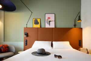 Postel nebo postele na pokoji v ubytování ibis Macon Sud Crêches