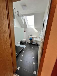 Postel nebo postele na pokoji v ubytování Wunderschöne Wohnung in Warnstedt mit Garten und Grill + 14 fotografií