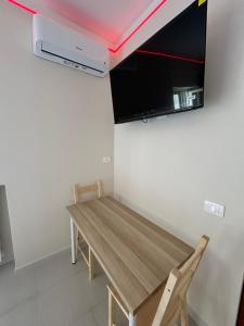 TV a/nebo společenská místnost v ubytování Panorama