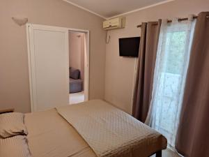 Postel nebo postele na pokoji v ubytování Guest House Edita