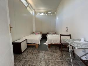 Postel nebo postele na pokoji v ubytování Rooms Asceric