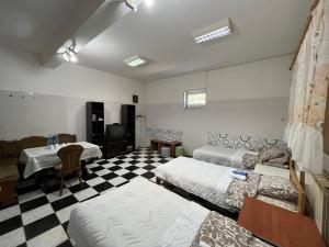 Postel nebo postele na pokoji v ubytování Rooms Asceric + 18 fotografií