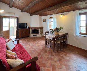 TV a/nebo společenská místnost v ubytování Agriturismo Melodie Toscane Sorano