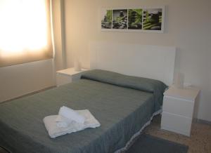 Postel nebo postele na pokoji v ubytování Apto. MdM