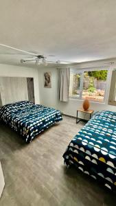 Postel nebo postele na pokoji v ubytování chambres d'hôtes en rez de villa avec piscine