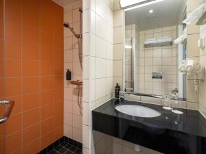 Koupelna v ubytování Quality Hotel Saga