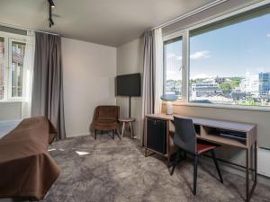 TV a/nebo společenská místnost v ubytování Quality Hotel Saga