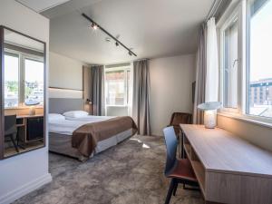 Postel nebo postele na pokoji v ubytování Quality Hotel Saga