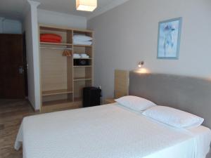 Postel nebo postele na pokoji v ubytování Polyxeni Hotel