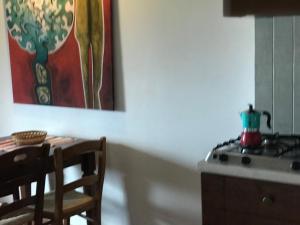 Kuchyň nebo kuchyňský kout v ubytování Agriturismo Melodie Toscane Sorano + 37 fotografií
