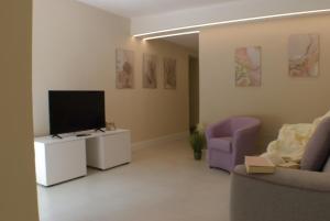 Μια τηλεόραση ή/και κέντρο ψυχαγωγίας στο Casa Lina, Vallombrosa, wifi, private area