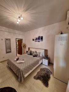Postel nebo postele na pokoji v ubytování Apartman Valeria