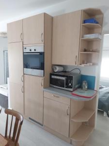 Kuchyň nebo kuchyňský kout v ubytování Apartmani Pavic