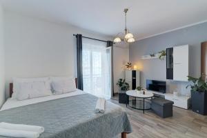 Posteľ alebo postele v izbe v ubytovaní Ivan apartman